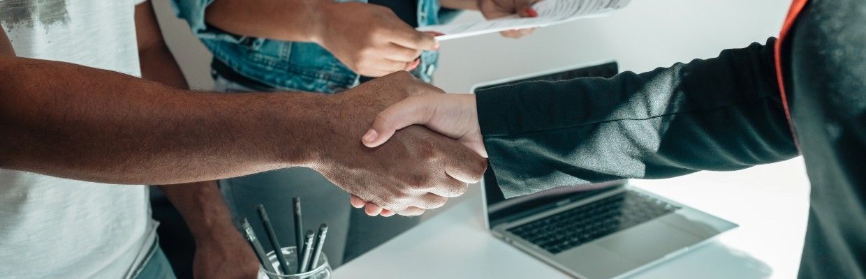 handshake between two people